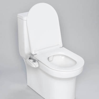 NEO 320 Plus Chrome installed on a modern toilet, with lid open