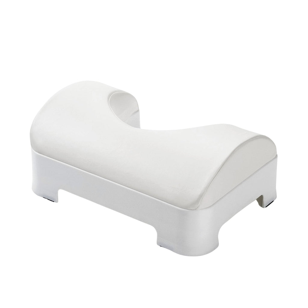 LUXE Footstool consists of a cushion on top of a plastic base, angled view
