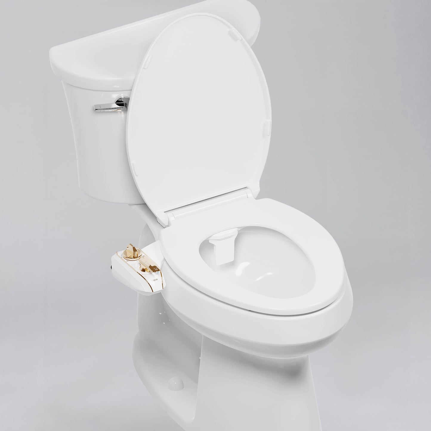 NEO 320 Plus Gold on a toilet