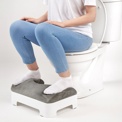 Model using LUXE Footstool with Soft Gray Velour Cover Installed