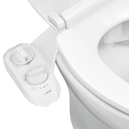 NEO 120 Plus White installed on a toilet with water spraying from nozzles