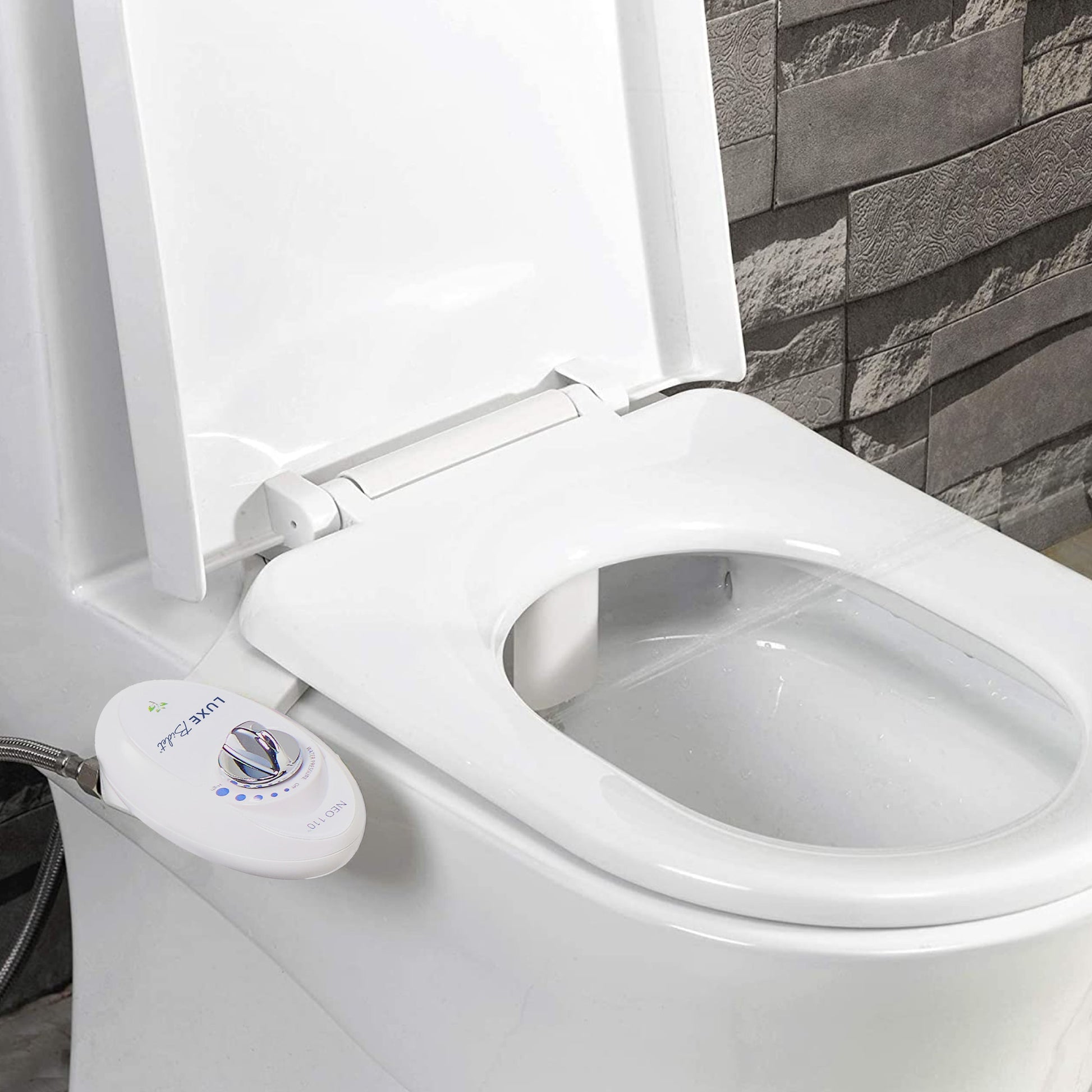 NEO 110 White installed on a toilet with water spraying from nozzles