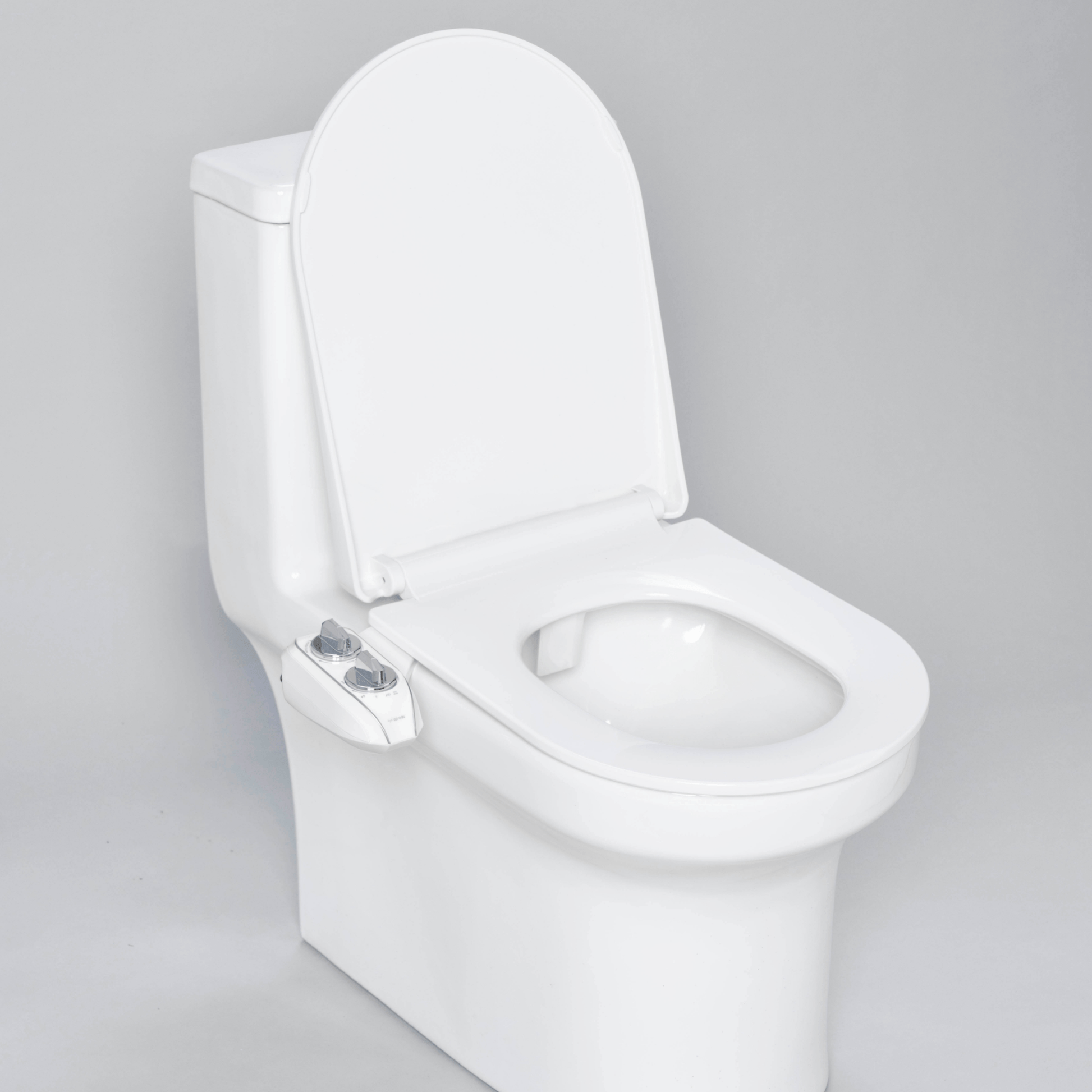 NEO 120 Plus Chrome installed on a modern toilet, with lid open