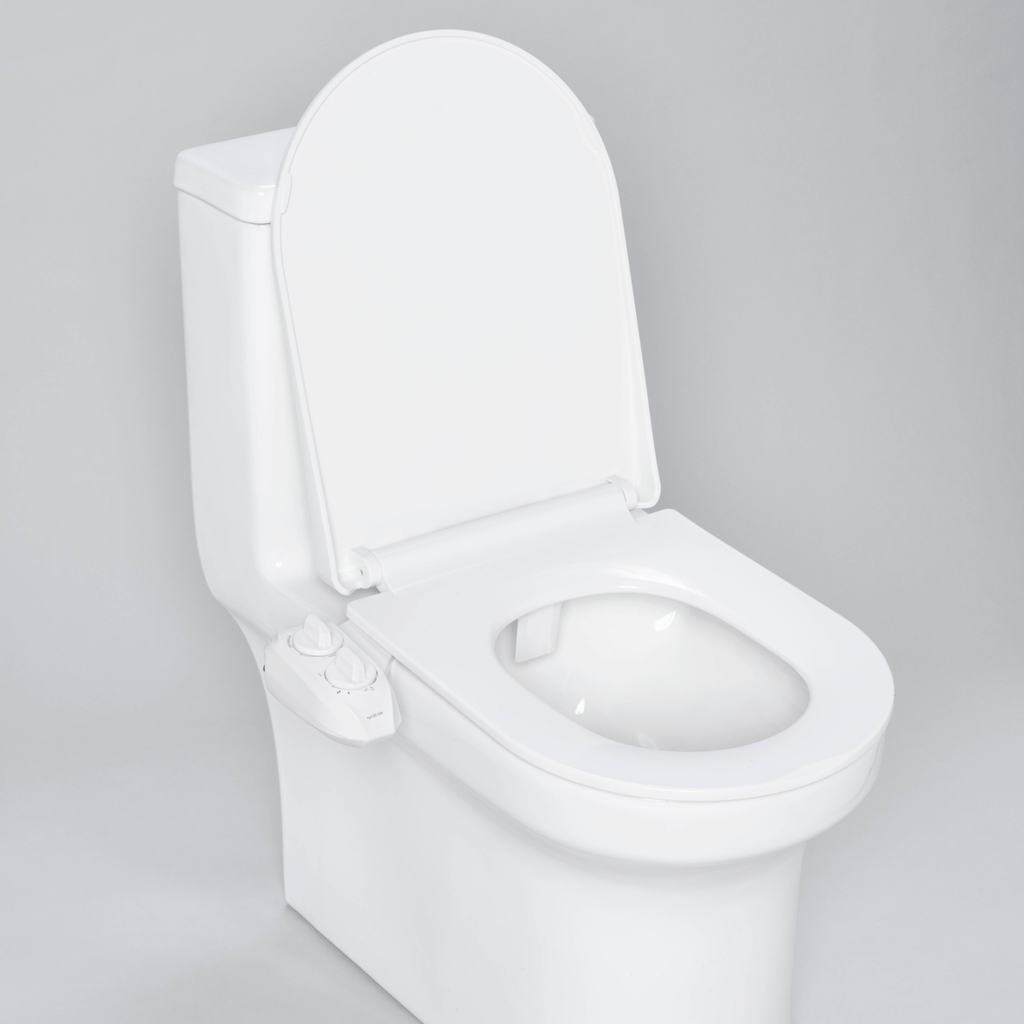 NEO 120 Plus White installed on a modern toilet, with lid open