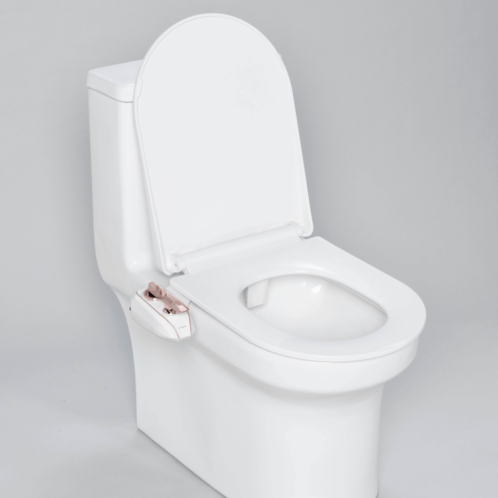 NEO 320 Plus: Imperfect Packaging - NEO 320 Plus Rose Gold installed on a modern toilet, with lid open