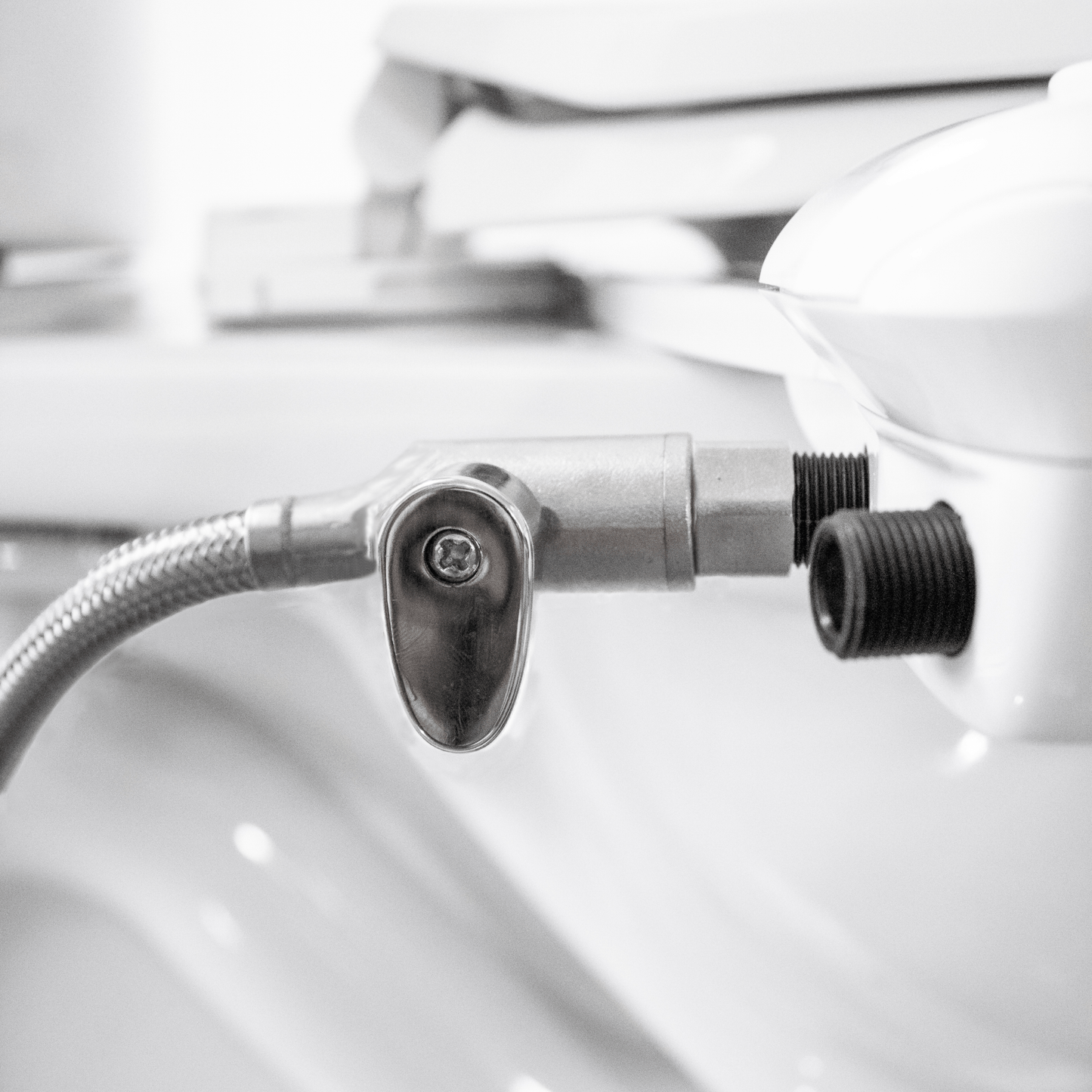 Cold Water Shut-Off Hose, with lever attached to the bidet body, in the off-position