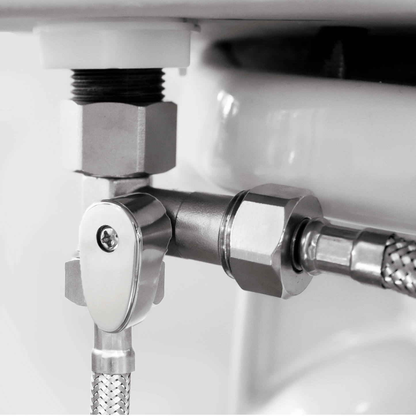 Cold Water Teardrop Nickel Shut-Off T-Adapter for NEO series installed at the toilet fill valve, in the off position