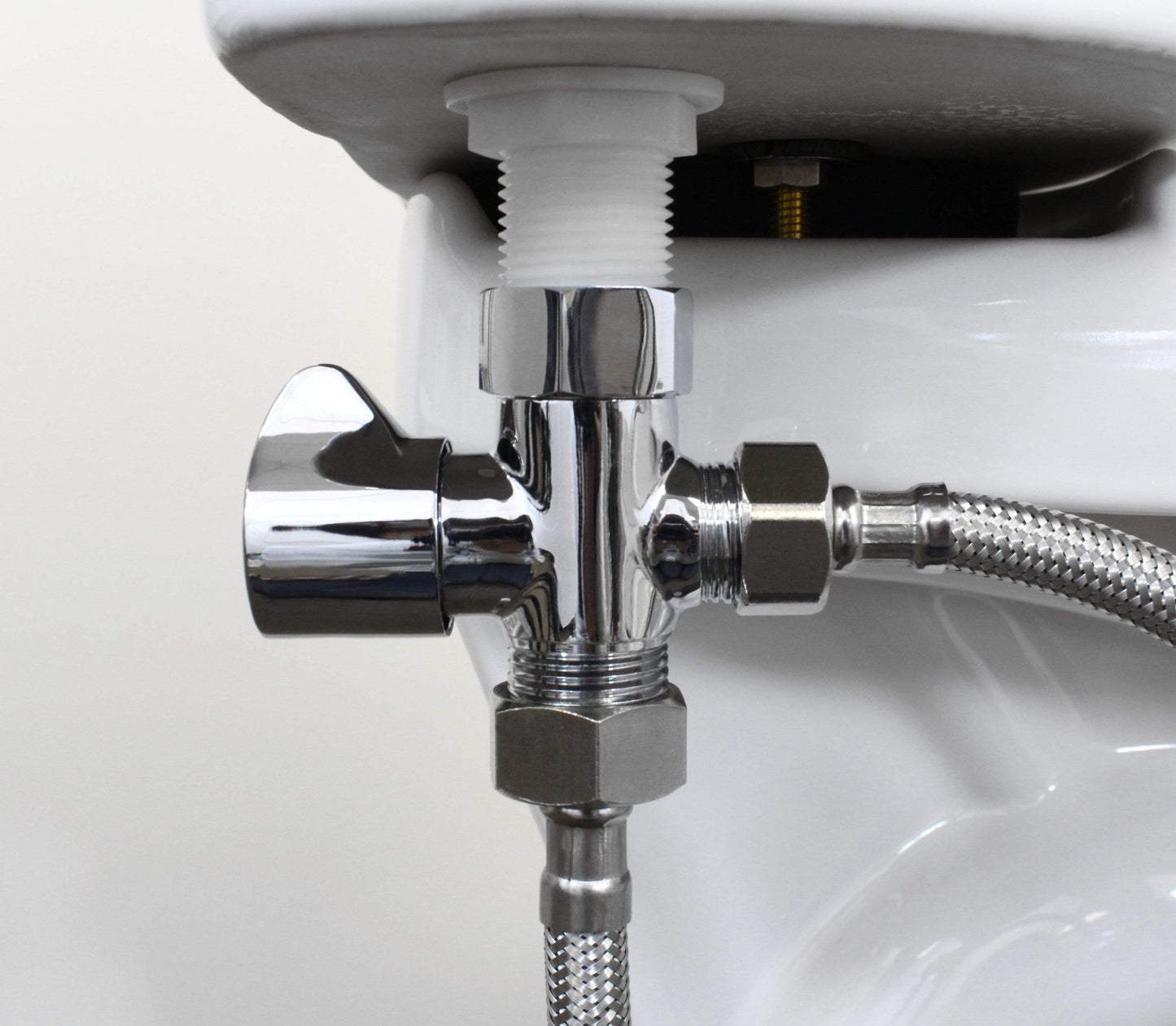 Cold Water Winged Chrome Shut-Off T-Adapter for NEO series installed at the toilet fill valve
