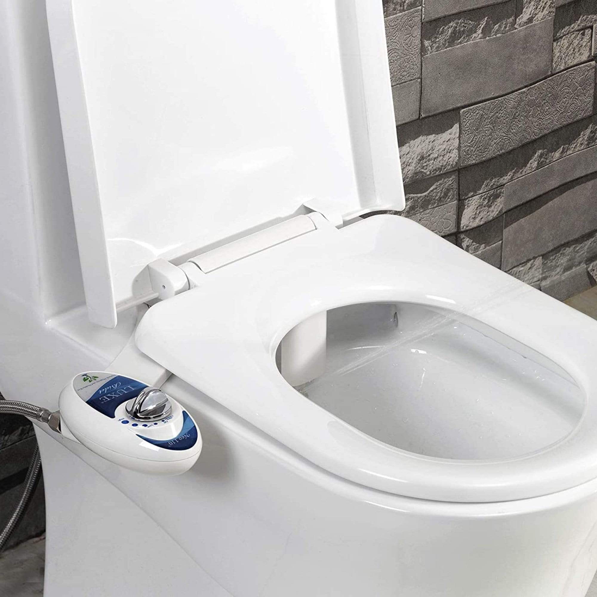 NEO 110: Imperfect Packaging - NEO 110 Blue installed on a toilet with water spraying from nozzles