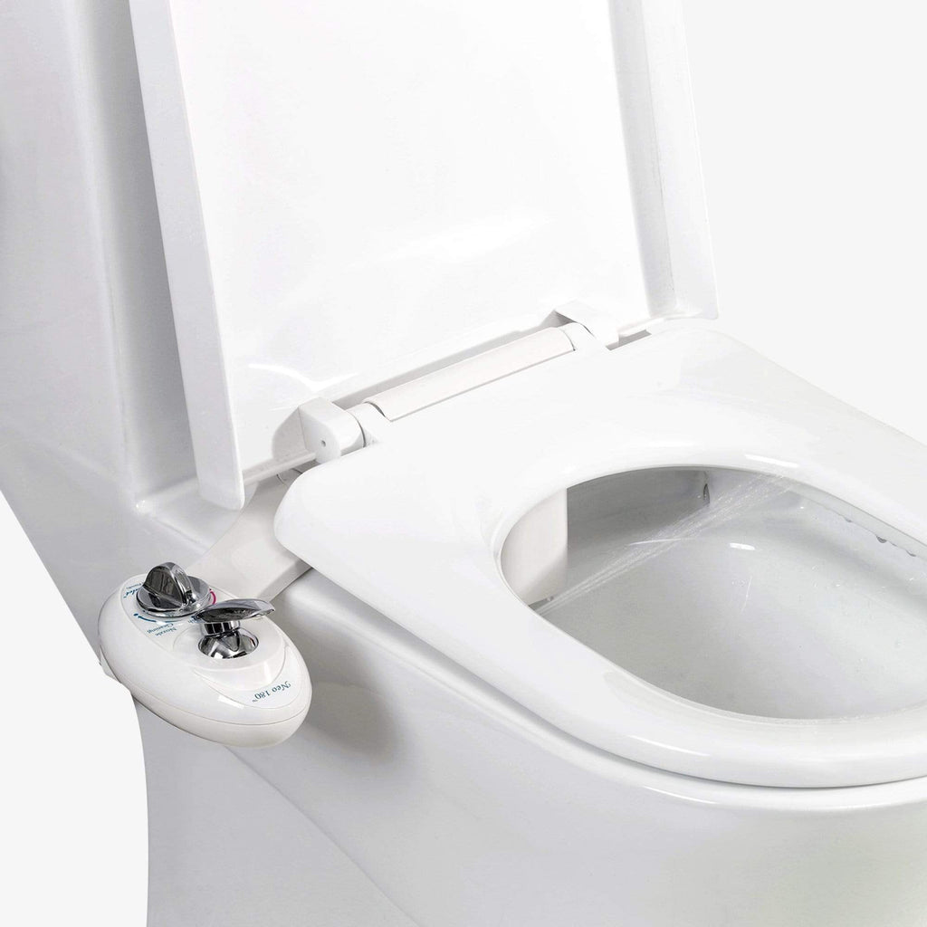 NEO 180 White installed on a toilet with water spraying from nozzles
